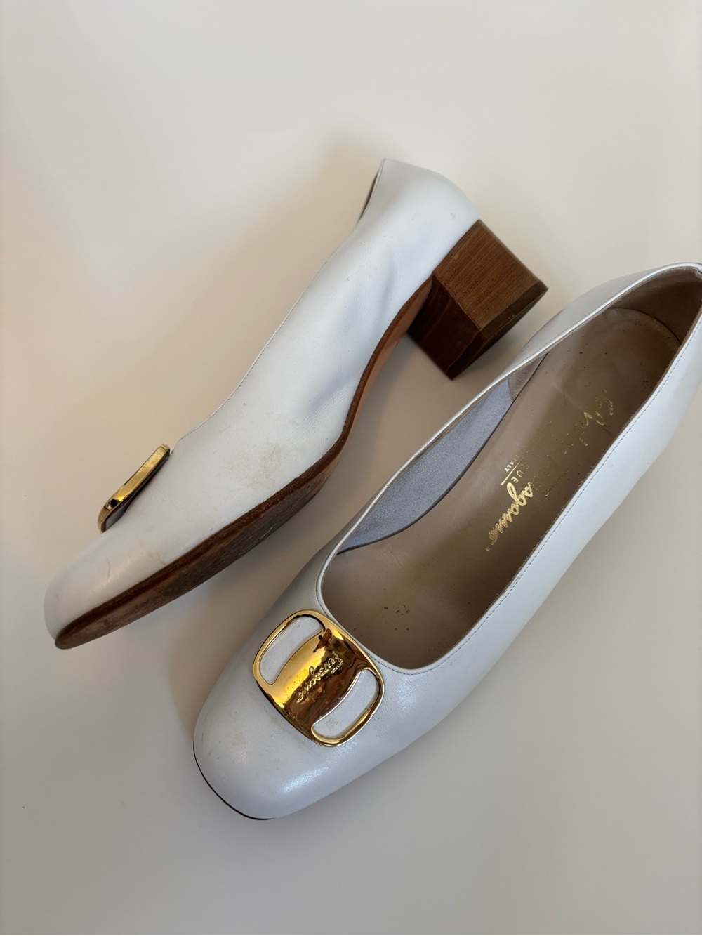 Salvatore Ferragamo White Leather Block Heel Pumps with Gold Buckle Accent